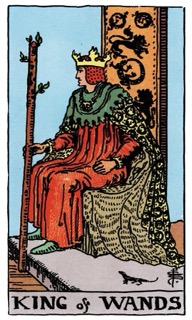 Rider–Waite–Smith King of Wands tarot card portraying a seated king with a wand, representing leadership, vision, and mastery of creative energy.